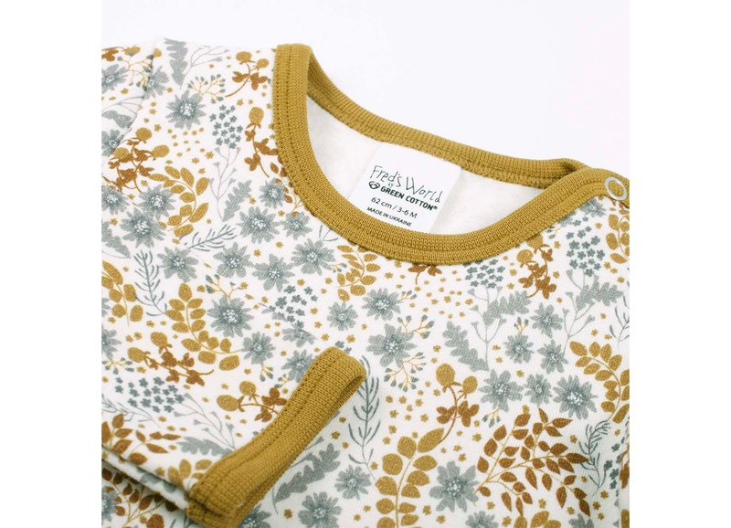 Der Body mit Blumenprint für Mädchen von Freds World ist ein tolles Geschenk zur Geburt.