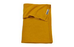 Die Knit Basic Babydecke in ockergelb von Meyco bei lachen lieben leben ist ein tolles Geschenk zur Geburt.
